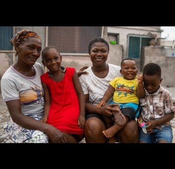 Gladys Modzaka and Charity Agbodo with their children and grandchildren, Denis, David, and Nancy. They made sure that the children received vaccinations to protect them from viral infections such as measles, chickenpox, polio, and even COVID-19. Credit: Gavi/2023/Michael Aboya