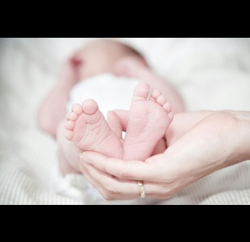 Newborns with high antibody levels at birth also had greater protection against COVID-19 infection during their first six months. Credit: Rene Asmussen on Pexels