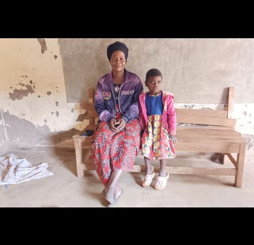 Hilda Makumba and her granddaughter, Hilda Masamba. Credit: Benson Kunchezera