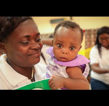 A mother and her child during the launch of the malaria pilot vaccine launched in Ghana in 2019. Credit: WHO/2019/Fanjan Combrink