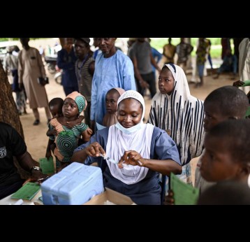 A health care worker prepares to administer yellow fever vaccine to a child at the Duhuma Health Post, Nigeria. Credit: Gavi/2023/Nr Dambali