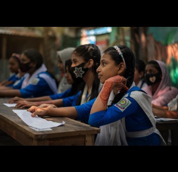 Girls sitting in a classroom in Bangladesh. Credit: Gavi/2023/Ashraful Arefin
