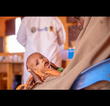 A child held by its mother after receiving the necessary doses of vaccines as part of the Reach Zero Dose Children (ZDC) campaign in Somalia. Credit: Gavi/2024/Mohamed Abdihakim Ali