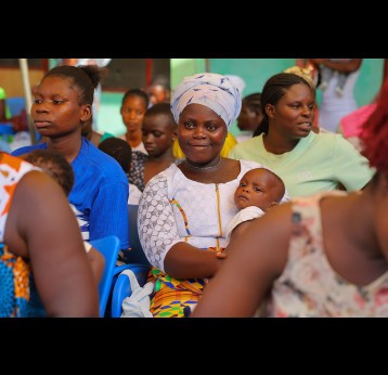 Mothers at an immunisation session at the Ominako Community-Based Health Planning and Services (CHPS) facility in the Eastern Region of Ghana, on May 6, 2025. Gavi/2025/Nipsh Dennis