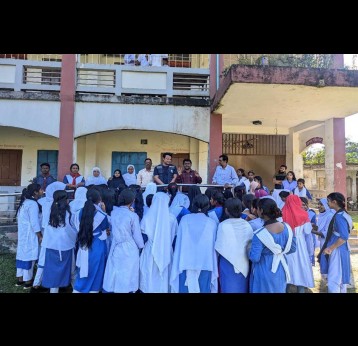 MODC delivering a speech to other schoolgirls on the HPV vaccination.