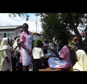 Children at Al-Khamis Islamic Day primary and nursery school queue for vaccination against yellow fever. Credit: Joyce Chimbi