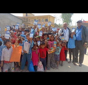 Children taking photos after receiving vaccination. Credit: Laxmeshor Jha