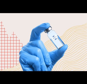 Hand holding a vaccine vial. Graphic designed by Svet Slavchev, incorporating stock elements.