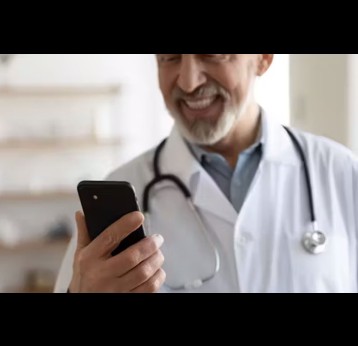 Doctor using AI to help build vaccine confidence. Credit: Shuttershock