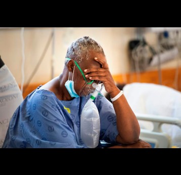A COVID-19 patient in South Africa, 2020. Rodger Bosch/AFP via Getty Images