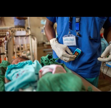 Staff at the Sendwe Hospital NICU in Democratic Republic of Congo care for newborn babies. Credit: PATH/Georgina Goodwin.