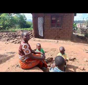 Maganga with her neighbours' children who had received the vaccine at Namame. Credit: Charles Pensulo
