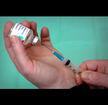 Syringe extracts vaccine dose. Credit: Centers for Disease Control and Prevention (CDC)