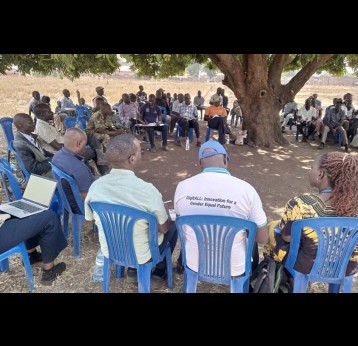 A team of health workers, village health teams (VHTs), and other community leaders meeting in Agoro to figure out how to stop cholera after the disease killed a woman. Credit: Denis Ocula