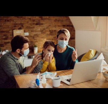 Worried family having video call with a doctor from home during coronavirus pandemic. Credit: Drazen Zigic/Freepik