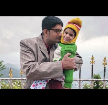 Deep Sankar Dasgupta with daughter Deepanwita Dasgupta, when she was 3 years old. Deepanwita was later diagnosed with subacute sclerosing panencephalitis, or SSPE, a rare but debilitating complication from a prior measles infection.(Anindita Dasgupta)