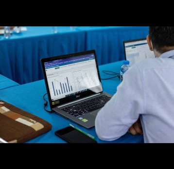 A DHIS2 user explores a dashboard during refresher training in May 2022. Credit: PSI Laos