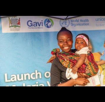 A mother taking her baby for malaria vaccination in Mansa, Zambia. Credit: UNICEF