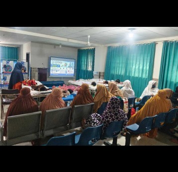 Mothers with their children, all of whom have SSPE, wait at a medical camp for examination by doctors. Credit: Al-Khidmat Foundation