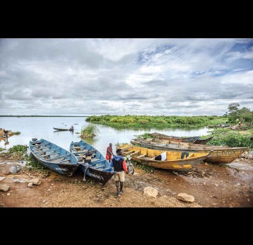 Boats on the shore in Uganda. Credit: Gavi/2025/Jjumba Martin