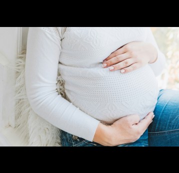 Pregnancy. Photo by Anastasiia Chepinska on Unsplash