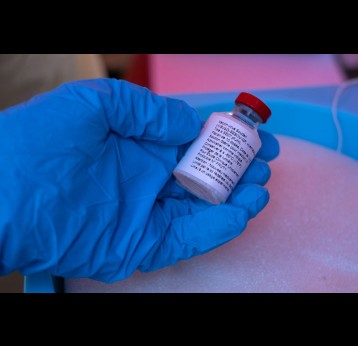 A nurse holds a vial of the Ebola Sudan vaccine during a trial at the Mulago Referral Hospital in Kampala, Uganda in February 2025. Badru Katumba/AFP via Getty Images
