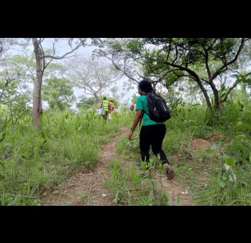 The vaccination team heads towards a Fulani forest camp, guided by a hunter. Credit: World Vision CAR