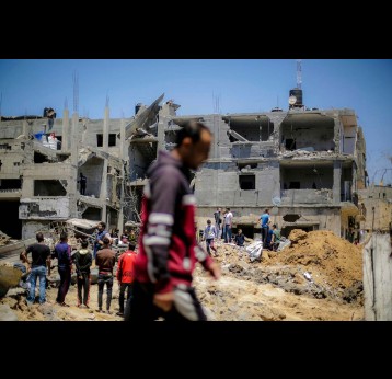 Residents inspect their destroyed homes. Photo by Mohammed Ibrahim on Unsplash