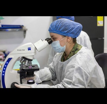 Female scientist. Photo by Navy Medicine on Unsplash