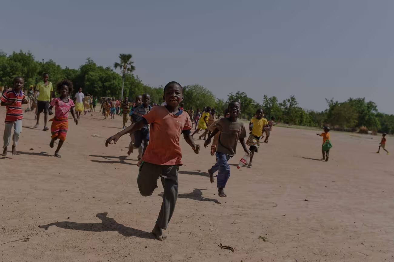 Children running in Burkina Faso. Credit: Gavi/2018/ T Noel