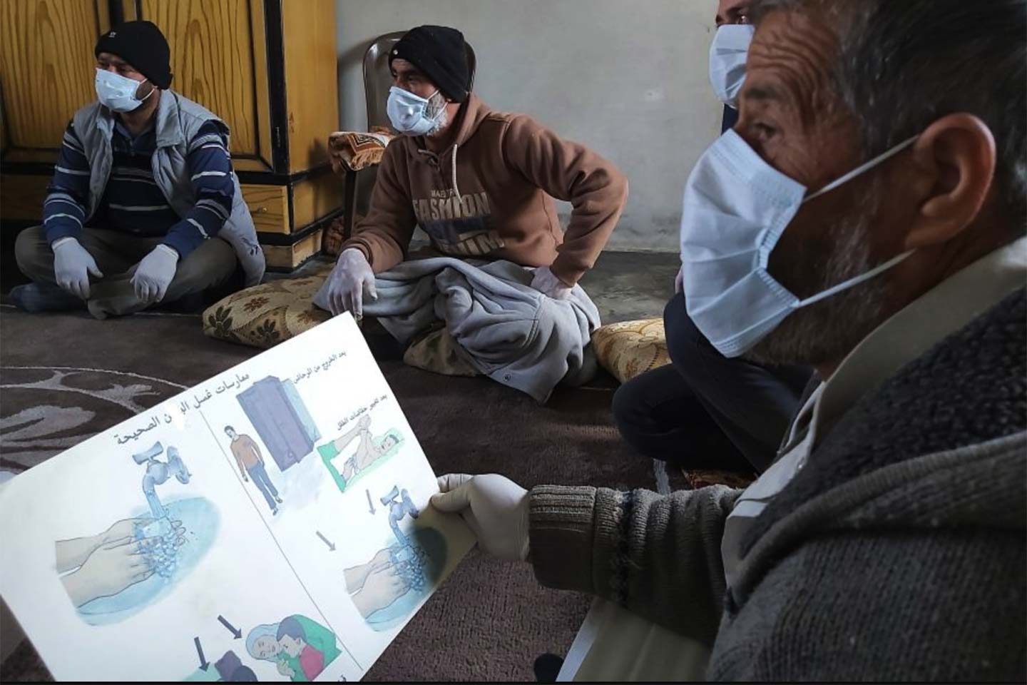 In Syrian refugee camps, health workers are educating people about the prevention of COVID-19. Image: SARD/Caritas Luxembourg