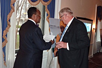 Wayne Madden, chairperson of Lions Clubs International Foundation and Dr Tebebe Yemane-Berhan compare notes before a Capitol Hill reception in Washington, DC, to celebrate the Lions-GAVI Alliance partnership.