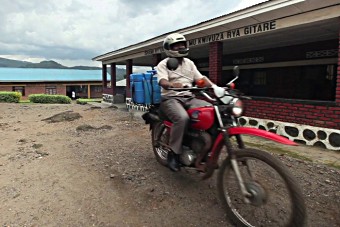 A health worker delivers the human papillomavirus (HPV) vaccine to a rural school in Rwanda