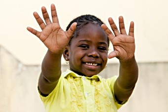 Child waving progress report 2009 front