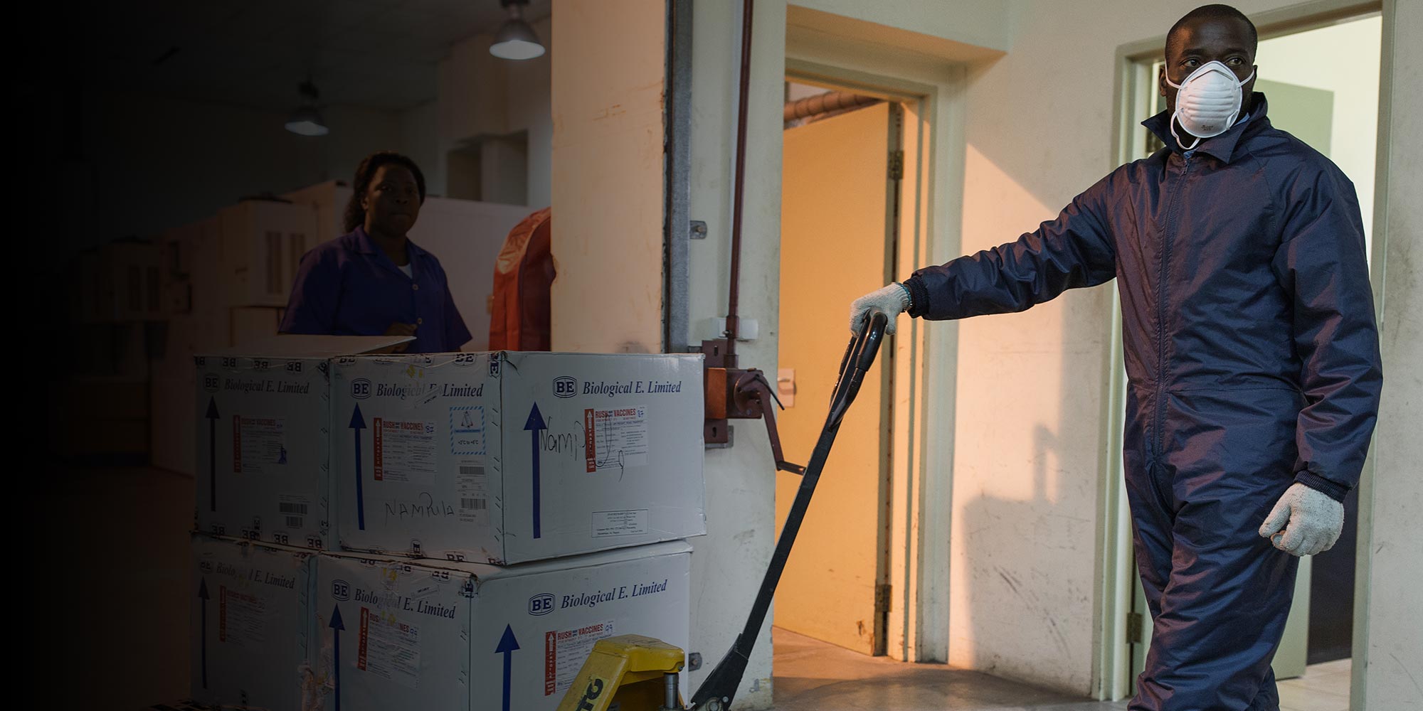 Lopes Simbo stores tetanus vaccines at the central cold storage in Maputo, Mozambique – Gavi/2020/Isaac Griberg