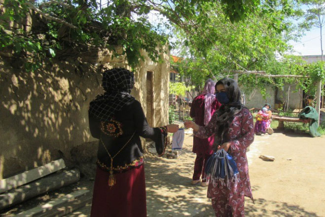 Public awareness campaigns launched by Afghan government's Citizen’s Charter program have encouraged hundreds of Afghan women like Shukria to step in voluntarily and help their communities with providing masks and awareness messages about COVID-19 virus. Photo Credit: World Bank