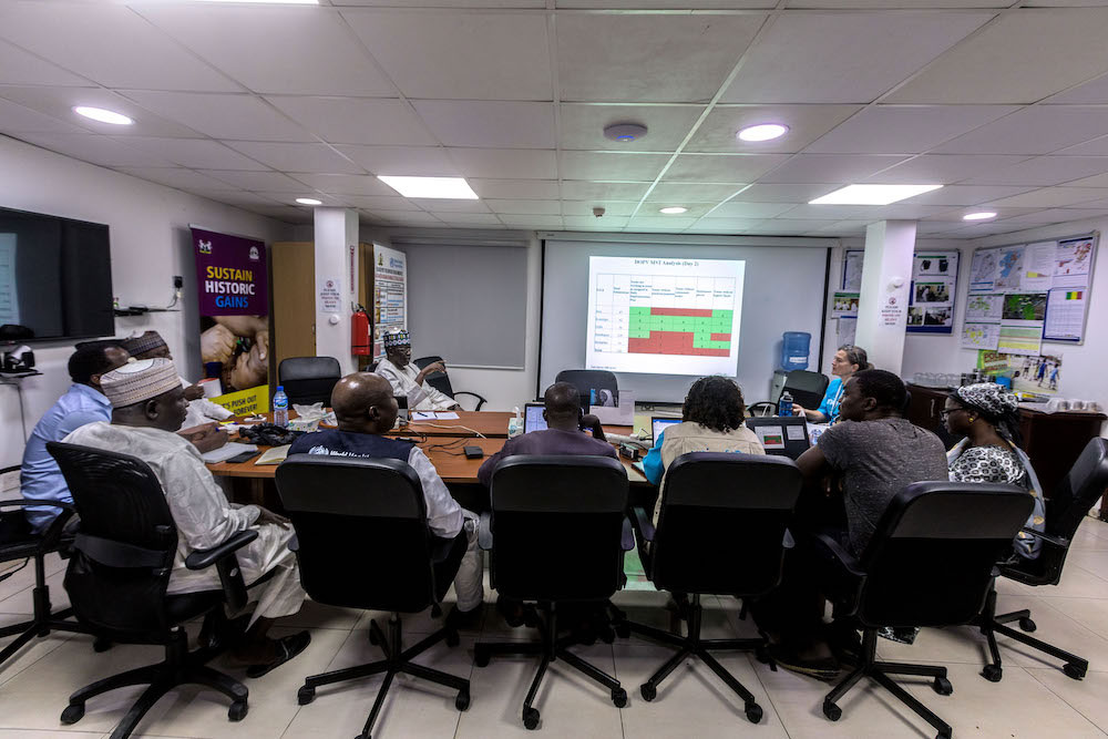 In Borno State's Emergency Operations Centre (EOC), polio teams deliberate on vaccine campaign performance. © Andrew Esiebo/WHO
