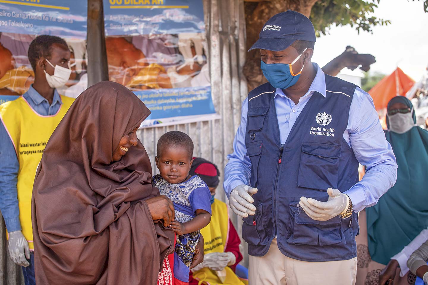 A young girl waits to be vaccinated during national polio and measles vaccination campaign in Mogadishu, Somalia on Tuesday 01 September 2020. Photo Ismail Taxta / Ildoog/WHO SOMALIA