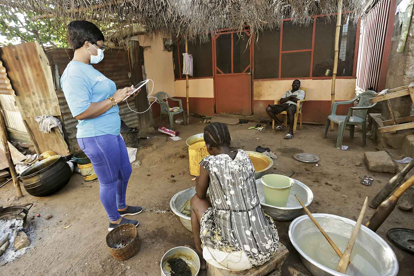 UNICEF Health and Nutrition Officer, Porbilla Ofosu-Apea on a house visit to monitor awareness of the polio vaccination campaign in the Volta Region on 9 September 2020.