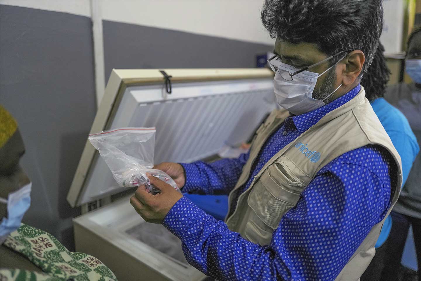 UNICEF Chief of Health and Nutrition, Dr Mrunal Shetye, inspecting vaccines in the cold room of the Maternal and Child Health Hospital in Kumasi, Ashanti Region, ahead of the campaign on 8 September 2020. ©UNICEF/ACQUAH