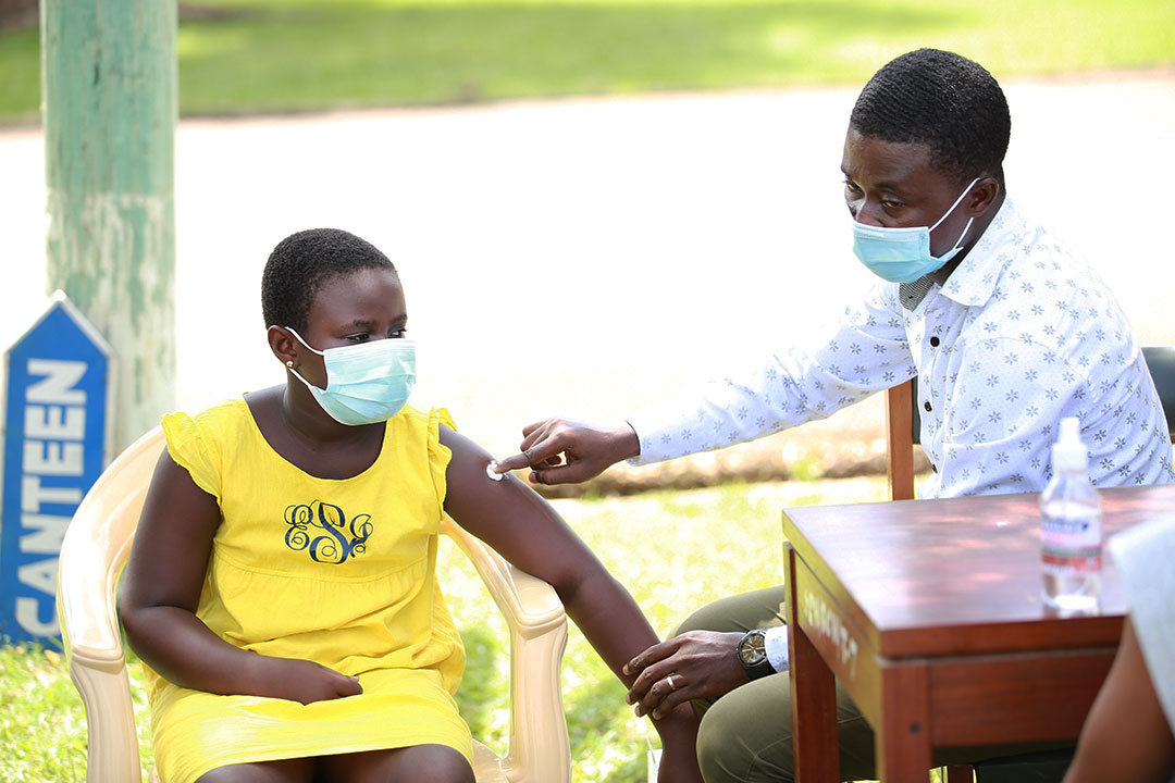 10-year-old Doris is vaccinated against yellow fever at the St Dominic Hospital in Denkyembour in the Eastern Region of Ghana. ©UNICEF/MILLS