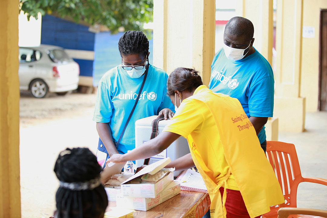 UNICEF Health Officials Josephine Agborson and Dr Peter Baffoe monitor progress of the yellow fever campaign in Kukurantumi in the Eastern Region. ©UNICEF/MILLS