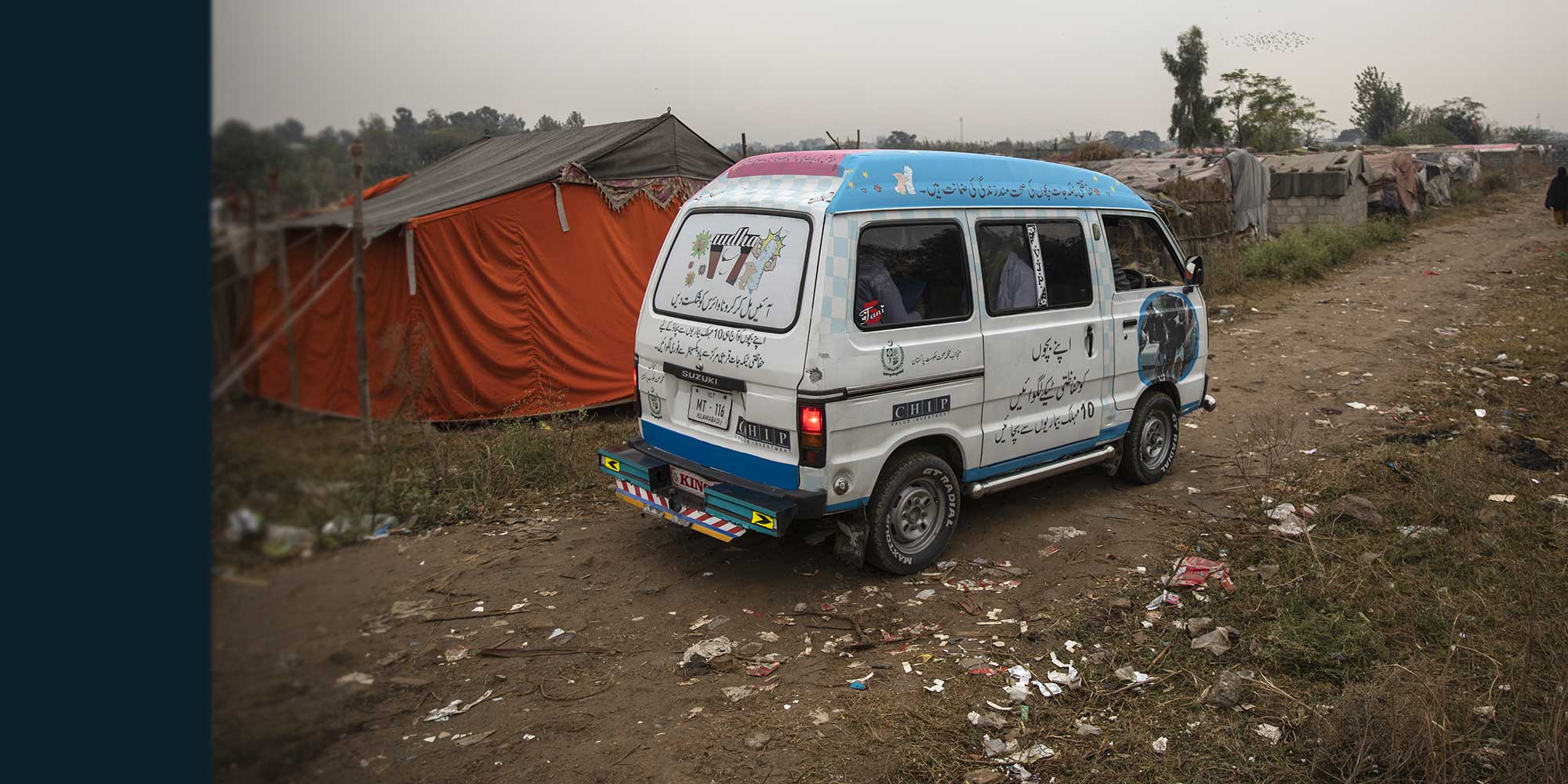 Close up of branded vehicle with Messages on Immunization in Urdu – Gavi/2020/Asad Zaidi