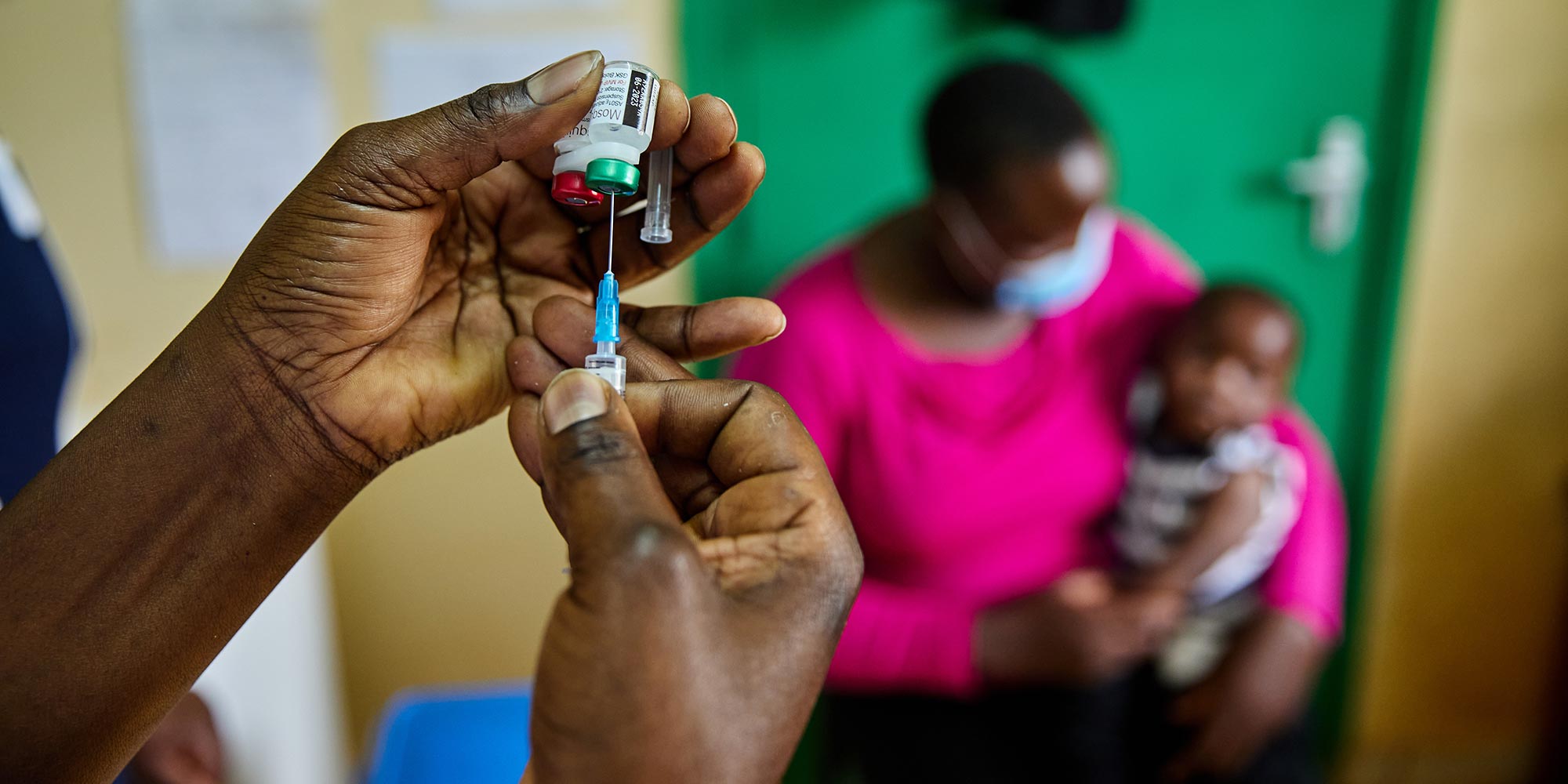 Nurse Janet Wanyama prepares to vaccinate a child against malaria at the Malava County Hospital, Kakamega, Kenya. Credit: Gavi/2021/White Rhino Films-Lameck Orina