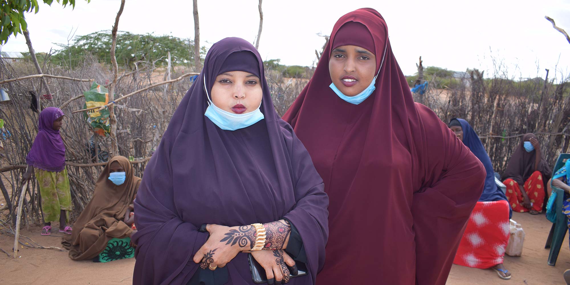 Khadija Maalim and Amina Abdi prepare for a TikTok video shoot in Athelay, Kenya.