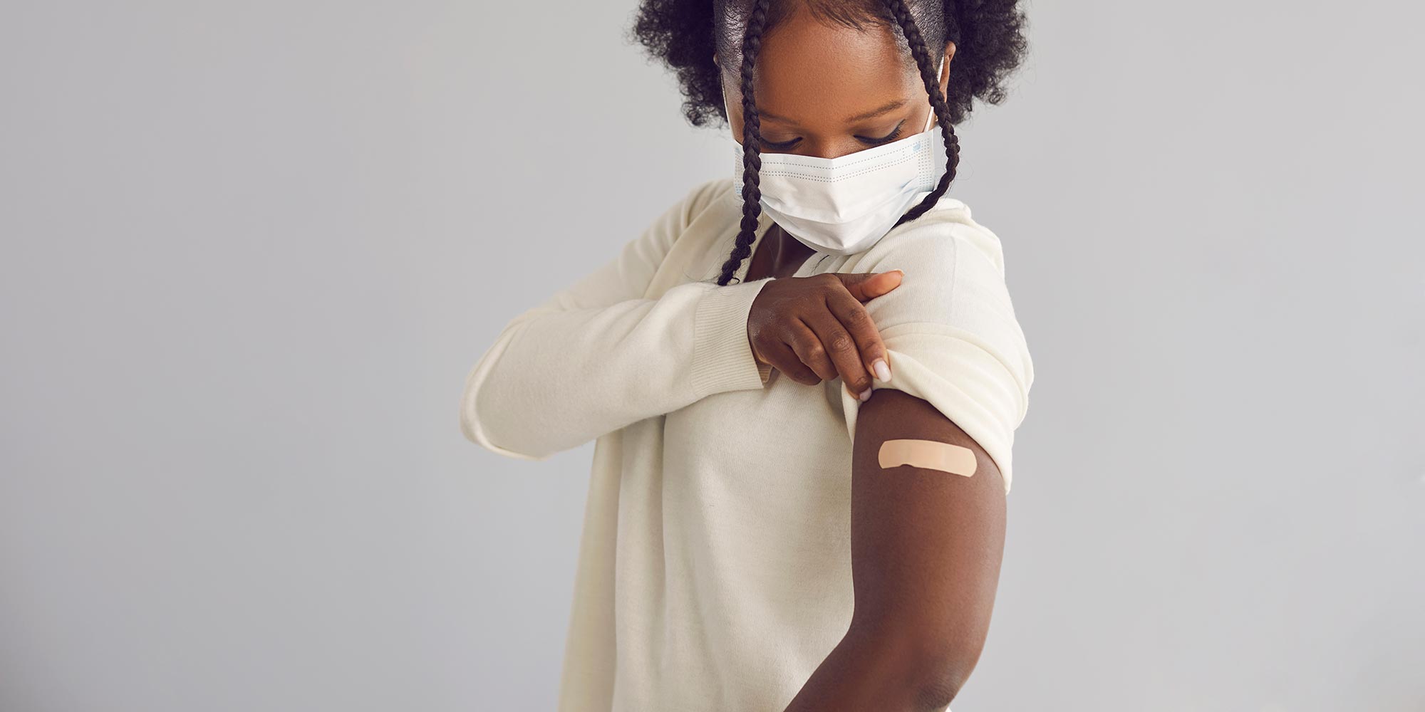 Woman receives COVID-19 vaccine injection