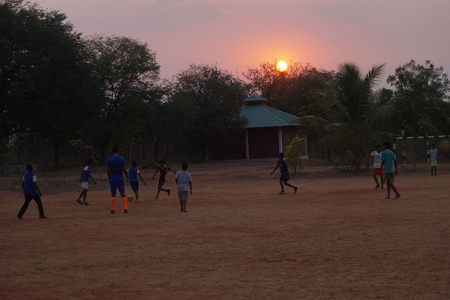 The evening football game with the setting sun HiRes. Credit: Babu Seenappa