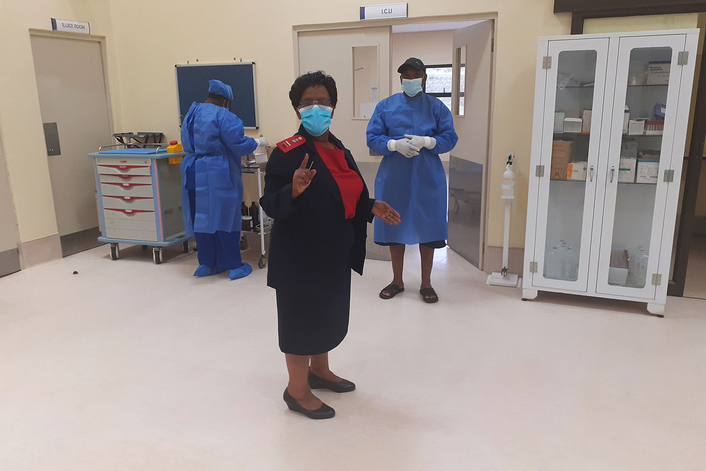 Matron Nurse Sibongile Simelane inspecting the emergency ward and staff prior to the arrival of a COVID-19 patient. Credit: Nonduduzo Kunene