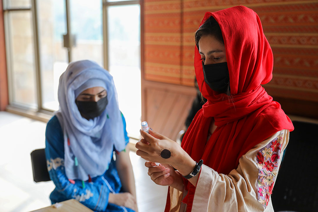 A health worker preparing COVID-19 vaccine in F9 Park Islamabad, Pakistan. This is the only facility in the country where people can ask to be administered a vaccine of their choice.