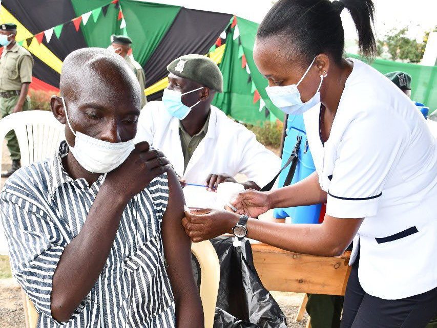 Evans Wandera, an inmate at Kamiti prison, receives his COVID-19 vaccine